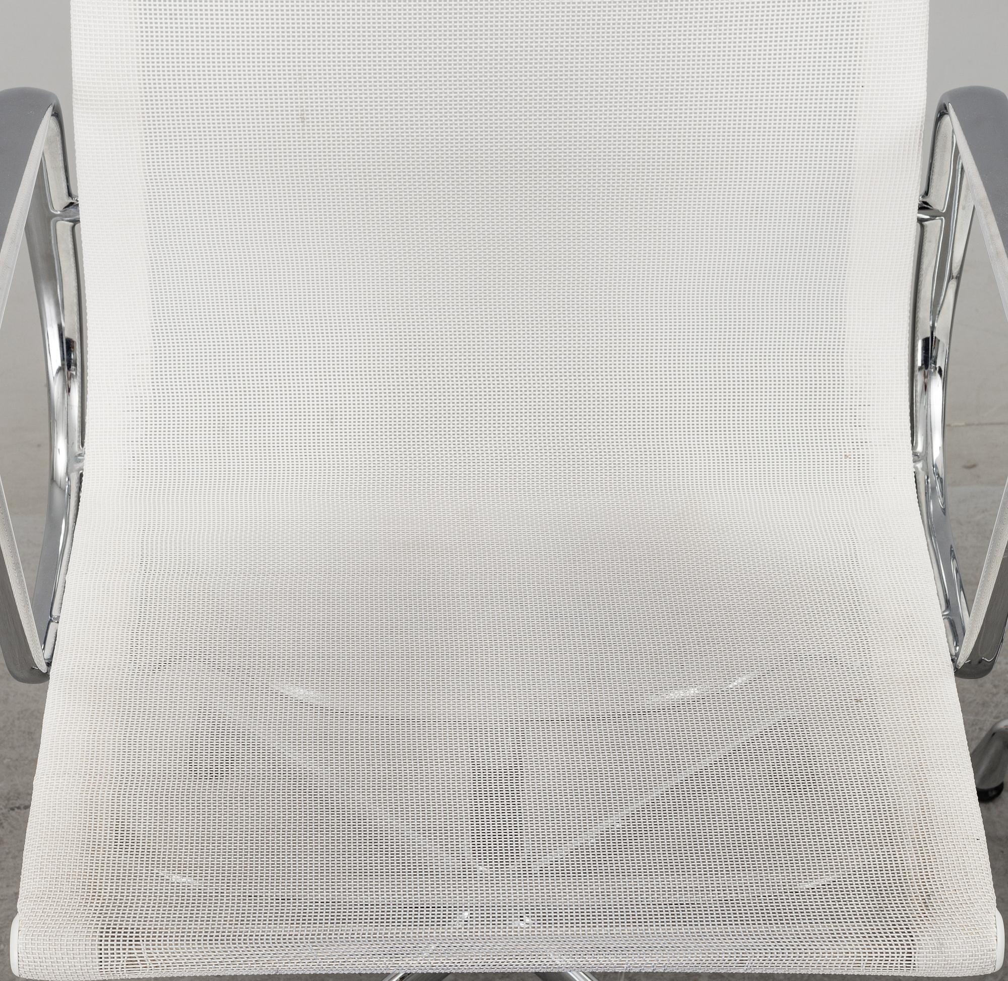 A pair of 'EA 108' desk chairs by Charles & Ray Eames for Vitra.