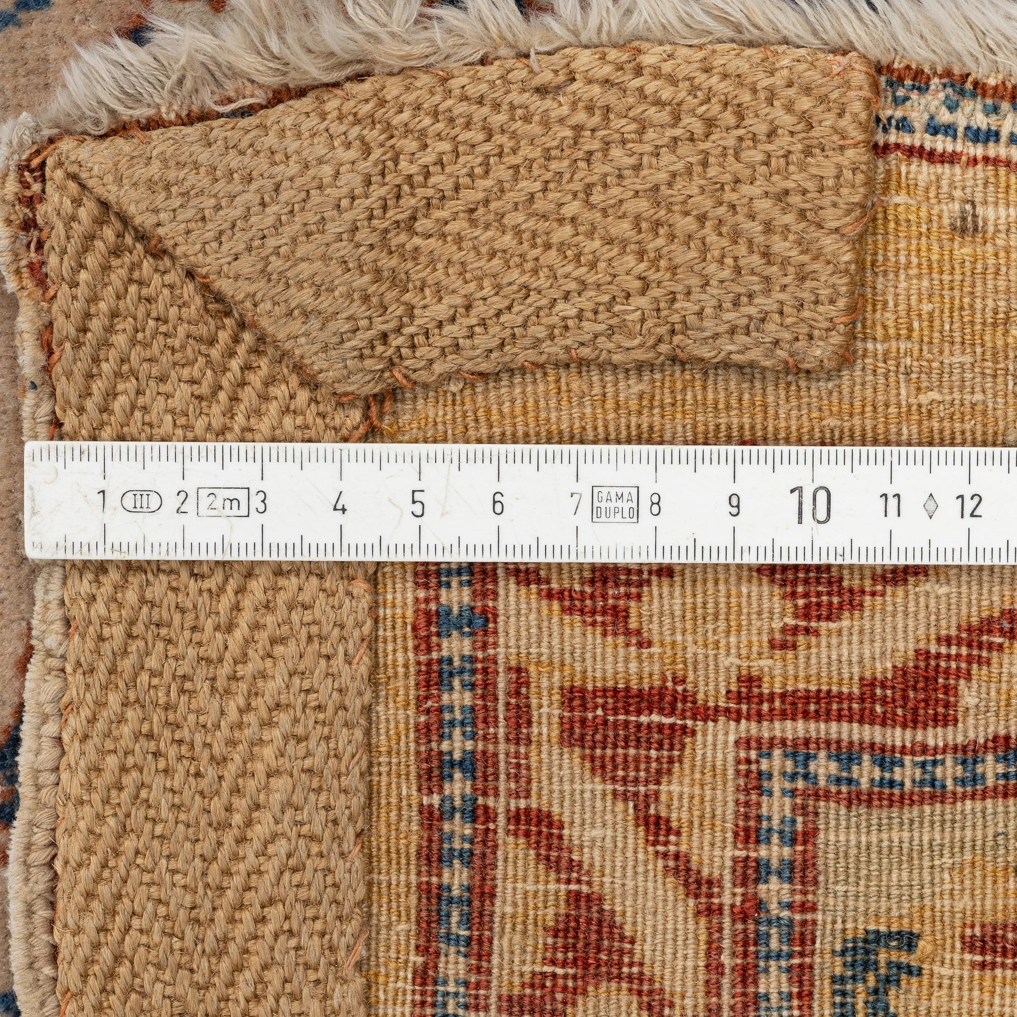 An antique 'Haj Jalili' Tabriz carpet, Northwest Persia, c. 430x310 cm.