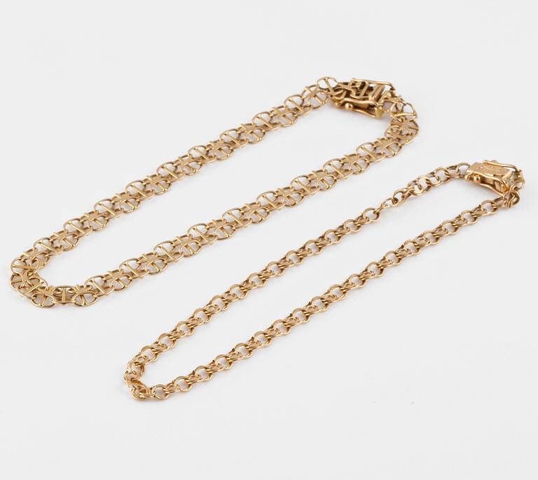 ARMLÄNKAR, 2 st, 18K guld, delvis Clareus, Stockholm.   Vikt 7,7 gram.