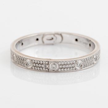 A Cartier "Love" bracelet in 18K white gold set with round brilliant-cut diamonds.
