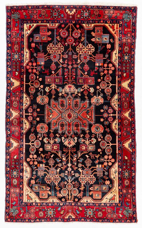 A oriental rug, c. 245 x 150 cm.