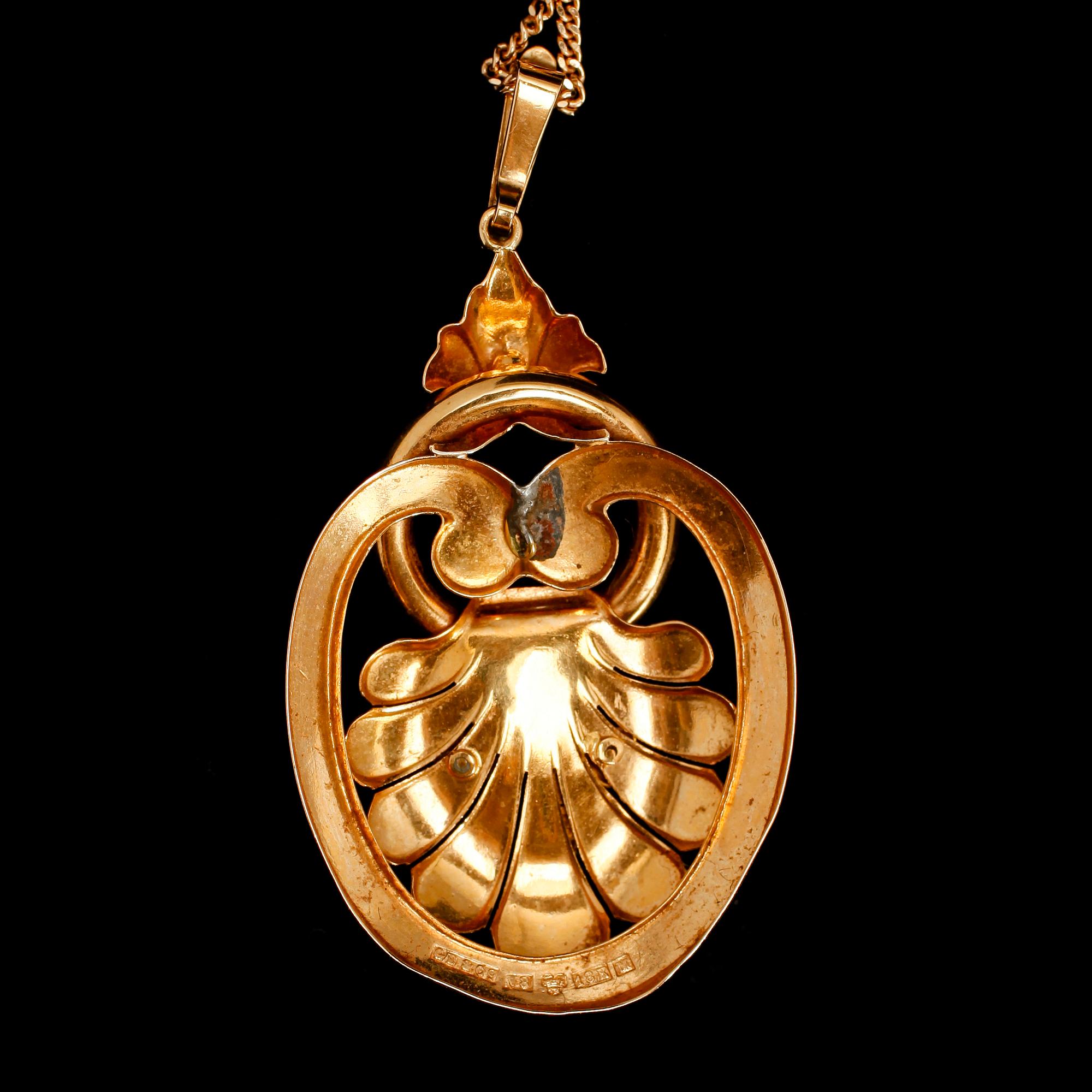 COLLIER MED HÄNGE, 18 k guld, hänge med svenska stämplar 1947. Vikt ca 10 g.