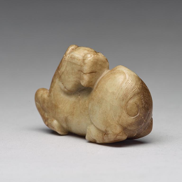 A carved nephrite figure, Ming dynasty (1368-1644).