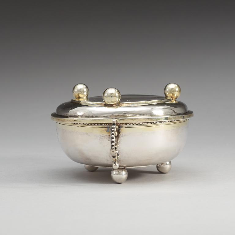 A Swedish early 18th century parcel-gilt bowl and cover, makers mark of Herman Hermansson, Gothenburg 1707.