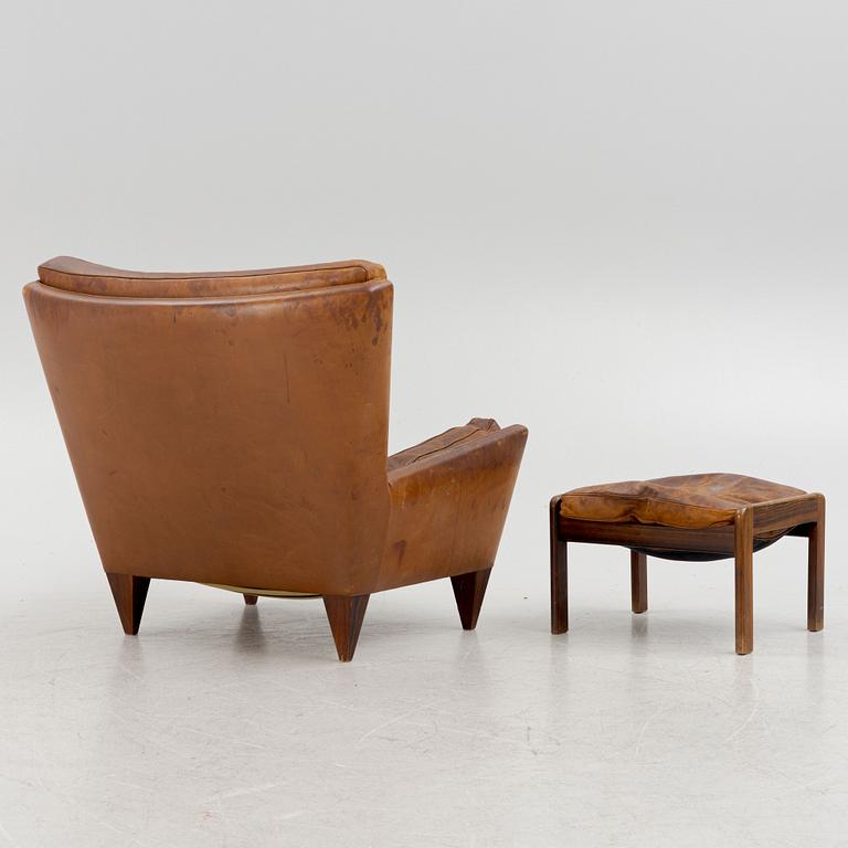 Illum Wikkelsø, a model V11 armchair and an ottoman by other maker, 1960's.