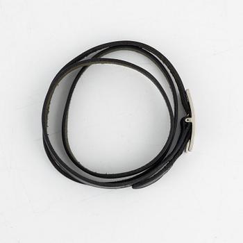 Hermès, a black leather 'Behapi' bracelet.