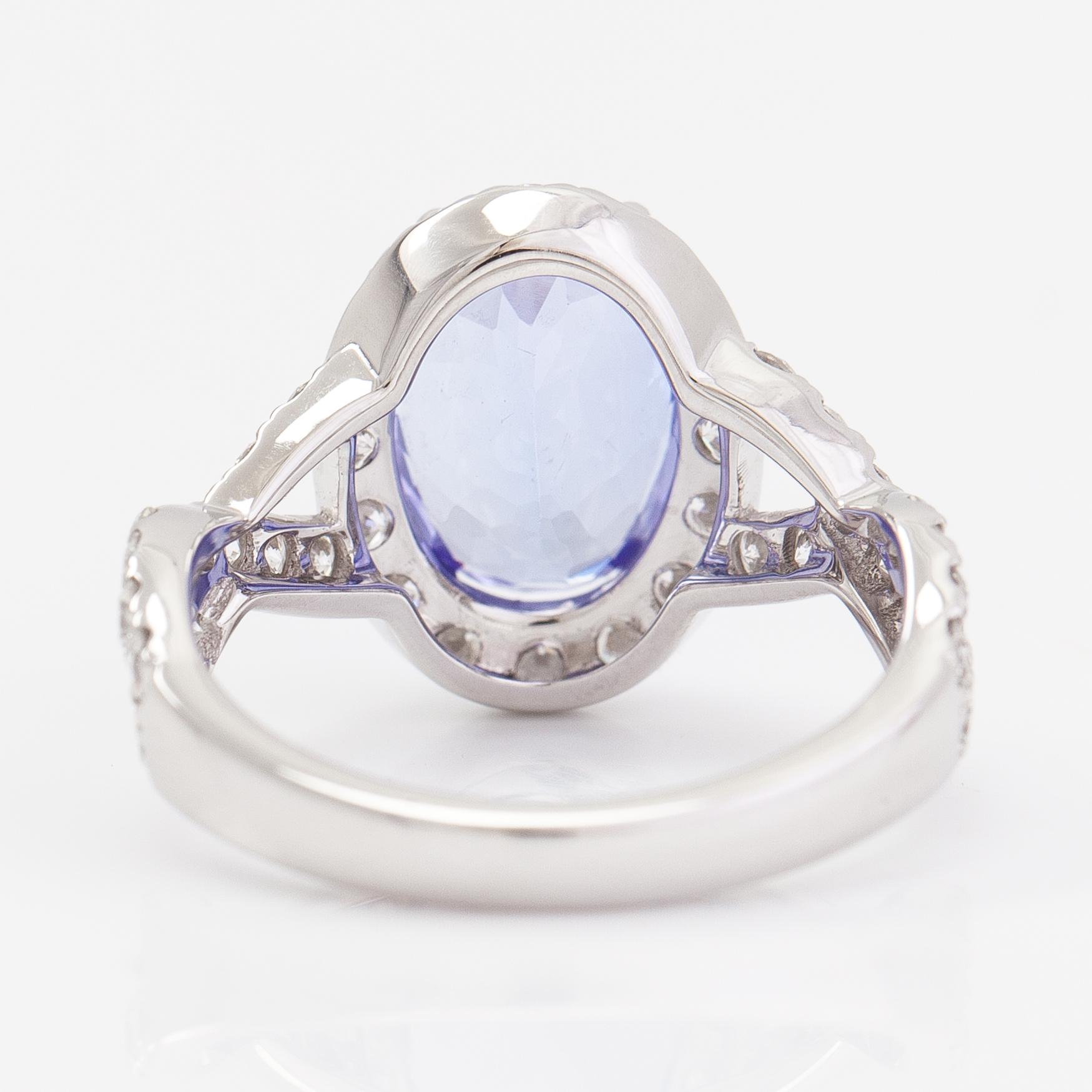An 18K white gold ring with a ca. 3.45 ct tanzanite and diamonds ca 1.53 ct in total. IGI certificate.