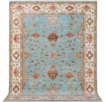An oriental carpet with Mamluk design, c. 303 x 239 cm.