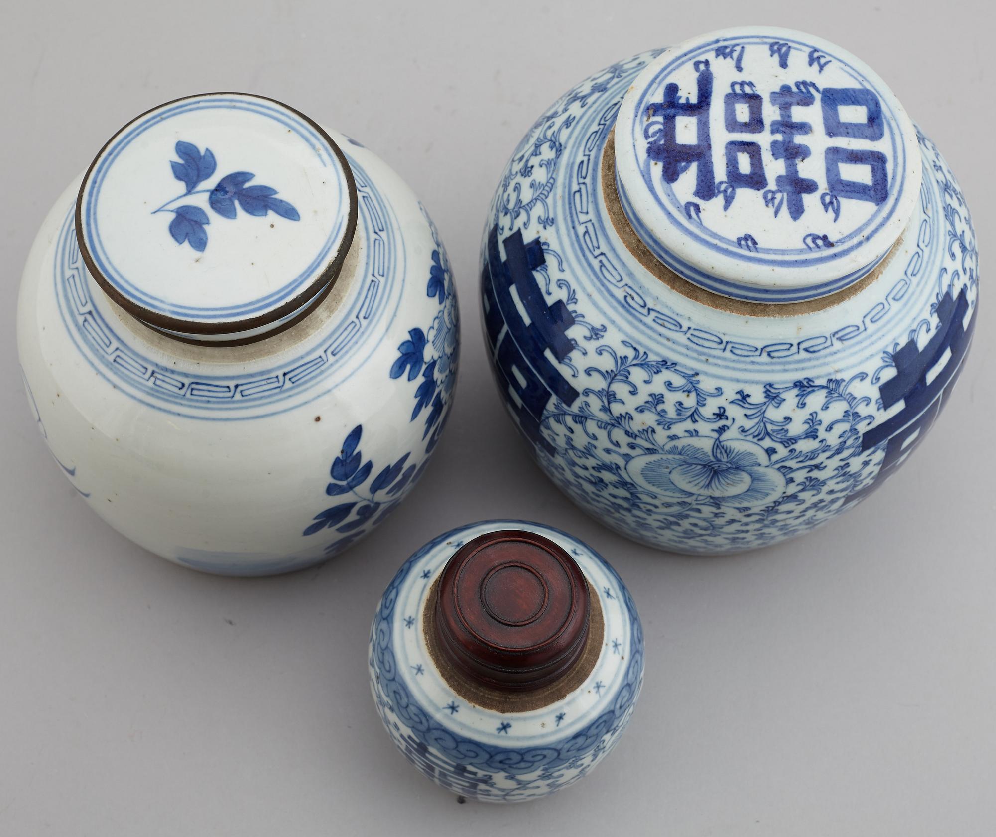 A set of three odd blue and white jars, late Qing dynasty, 19th Century.