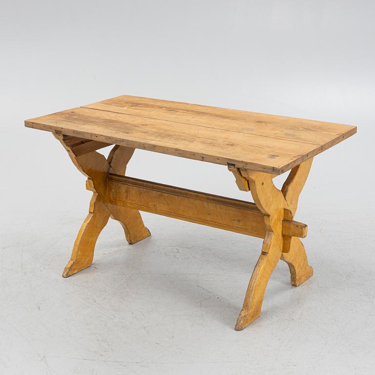 A pianted trestle table, 19th Century.