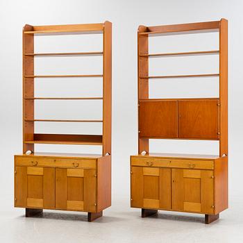 Josef Frank, two mahogany veneered bokkshelves, model 2112, Firma Svenskt Tenn, Sweden.