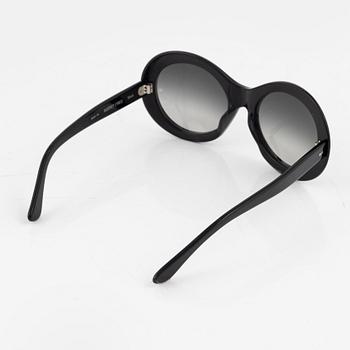 Oliver Goldsmith, a pair of black "Audrey" sunglasses.