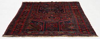An antique Northwest Persian rug, c. 179 x 143 cm.