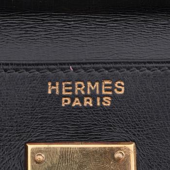 HERMÈS, a box black "Kelly 32" bag, before 1960.