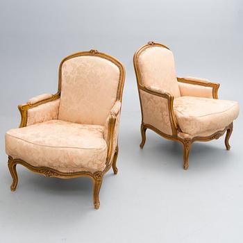 A pair of French 20th Century  bergère armchairs.