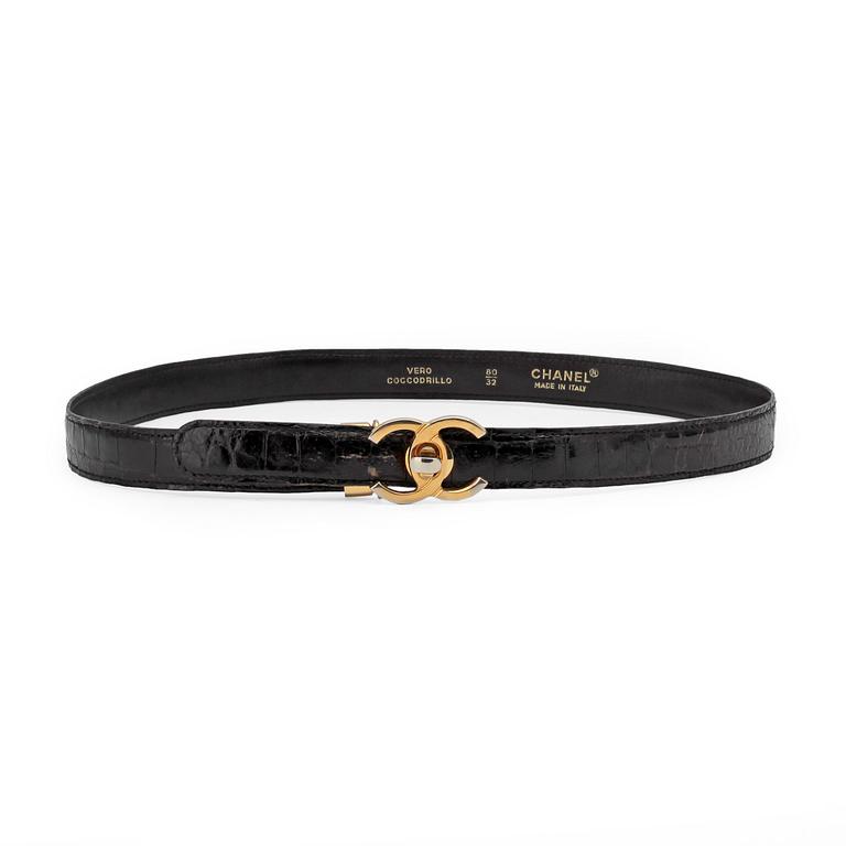 CHANEL, a black crocodile leather belt.
