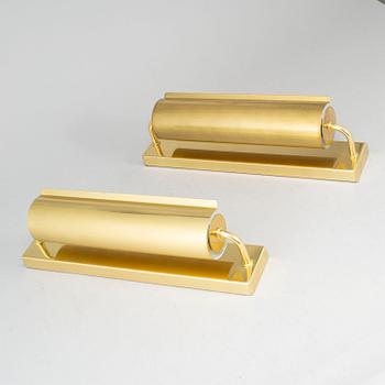 A PAIR OF BRASS WALL LAMPS FROM ÖIA.