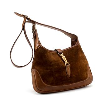 372. GUCCI, a brown suede shoulder bag.