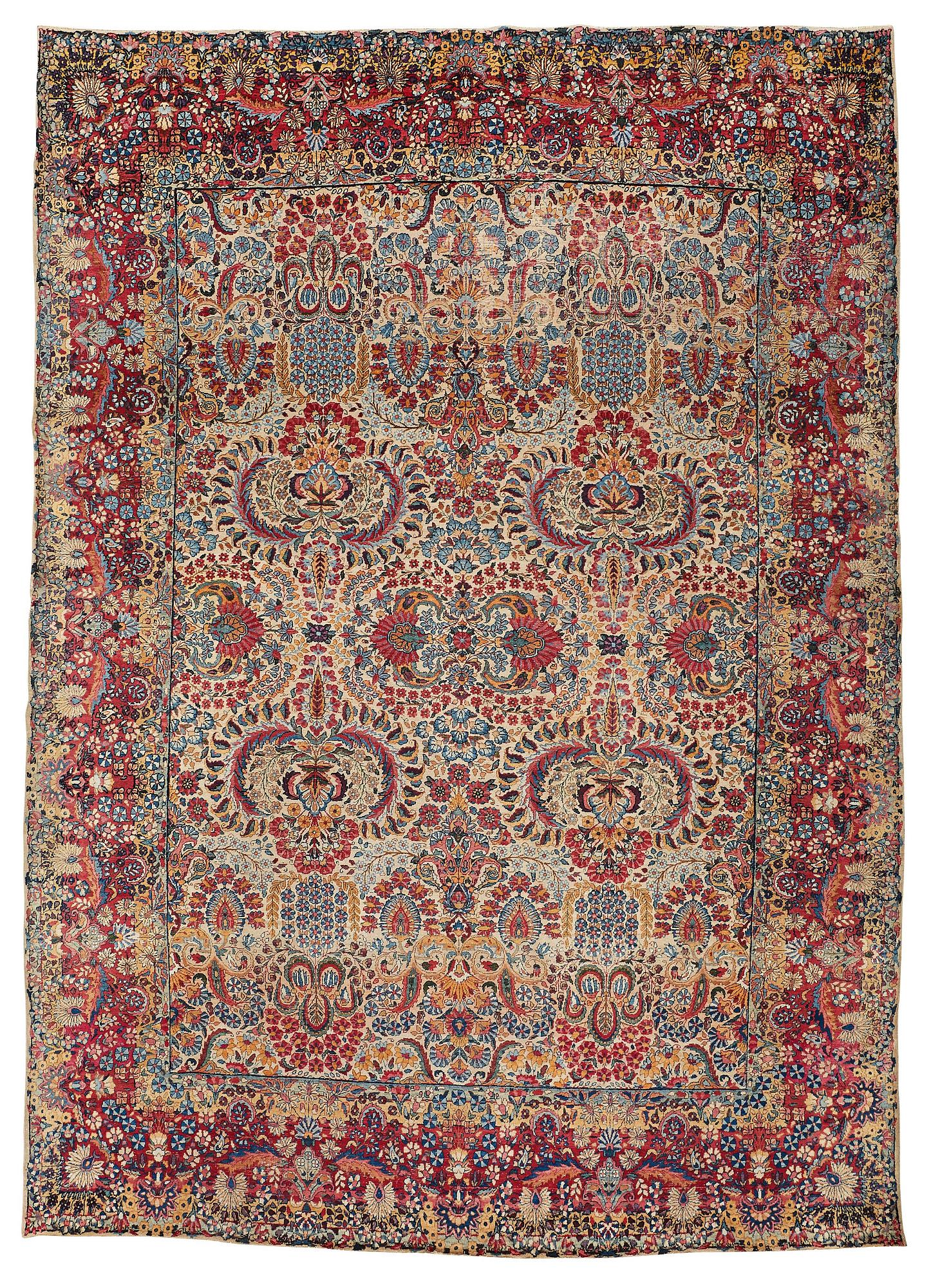 A carpet, a semi-antique Kerman, ca 375-379,5 x 268-271 cm.
