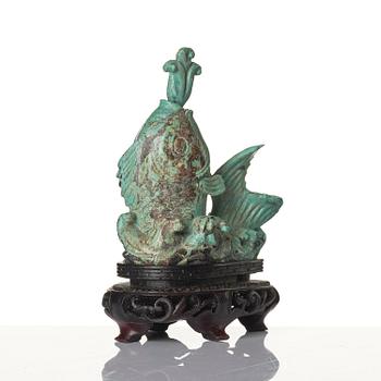 A well sculptured turquoise figure of a carp, Qing dynasty, 19th century.