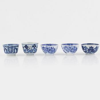 A group of thirteen cups, a bowl and a cup holder, four saucers, partly China and 18th century,