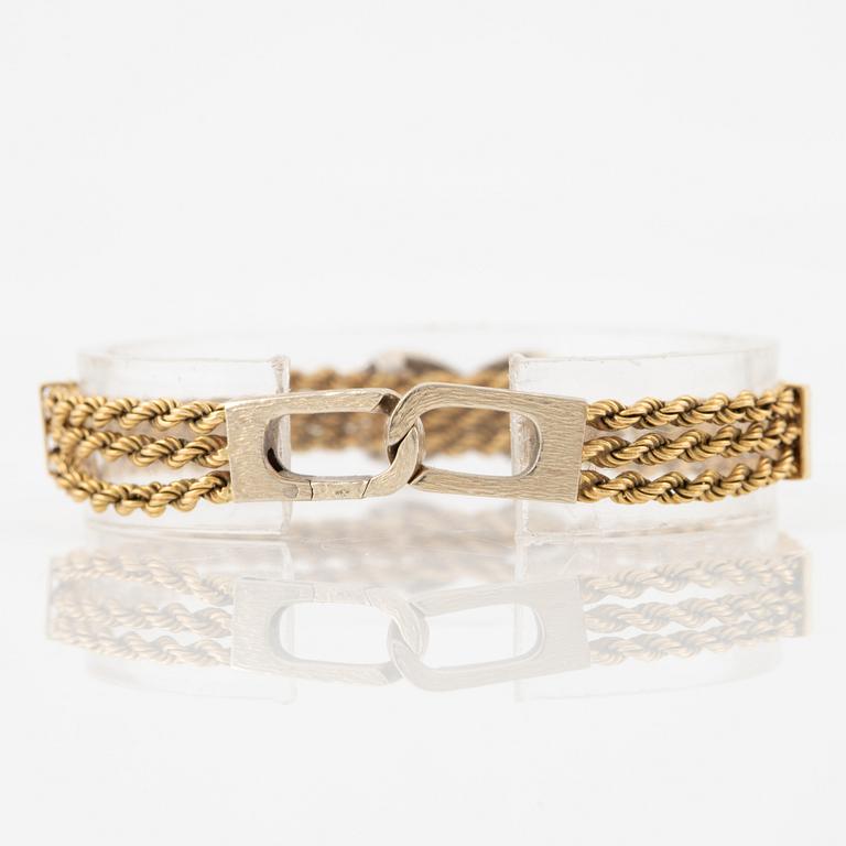 Bracelet in 18K gold with octagon-cut diamonds.