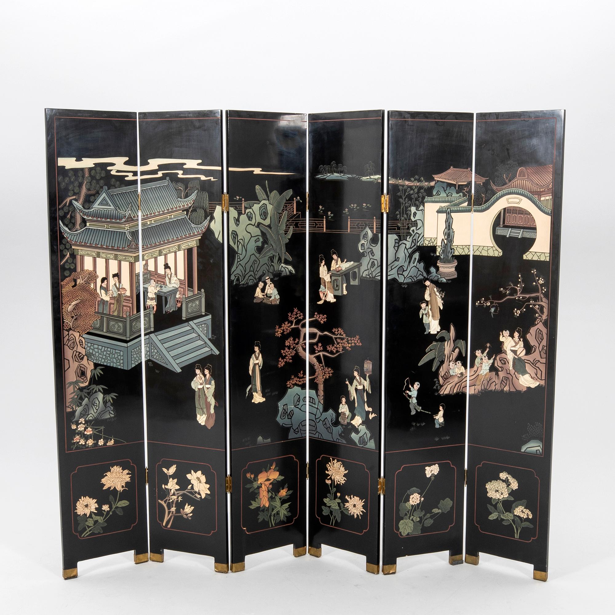 A Japanese lacquer folding screen 20th century.