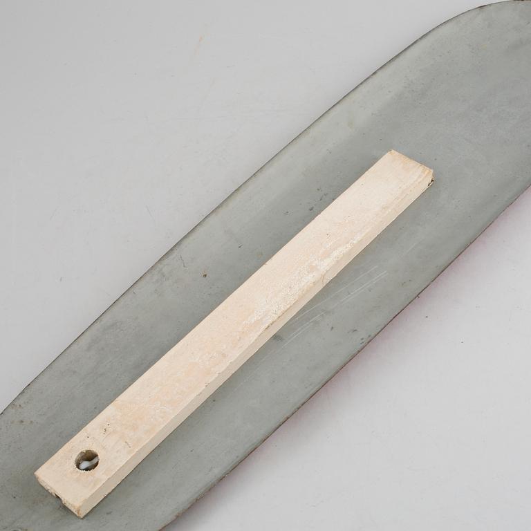 A Coa-Cola thermometer from the mid 20th century.