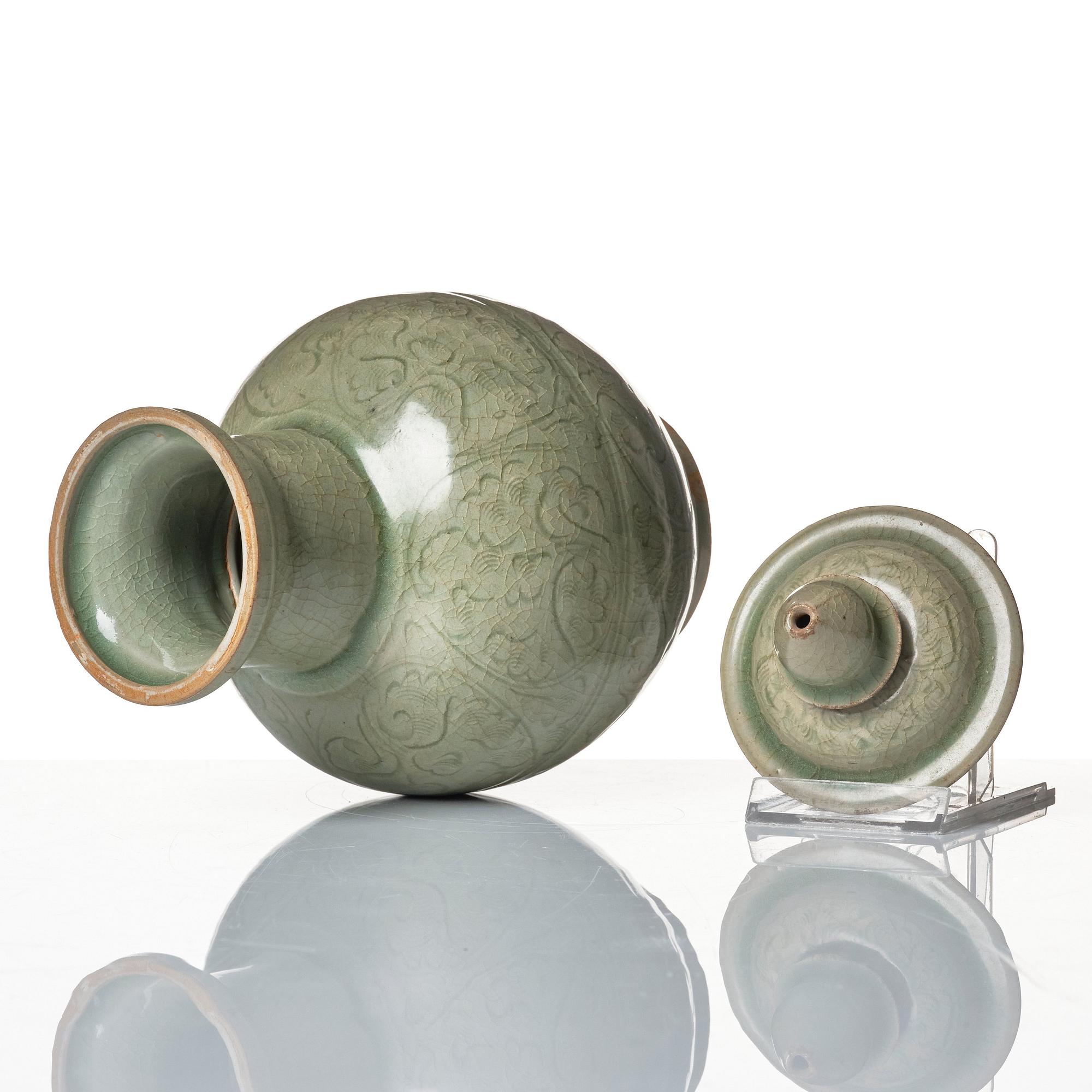 A celadon glazed jar with cover, Yuan dynasty (1271-1368).