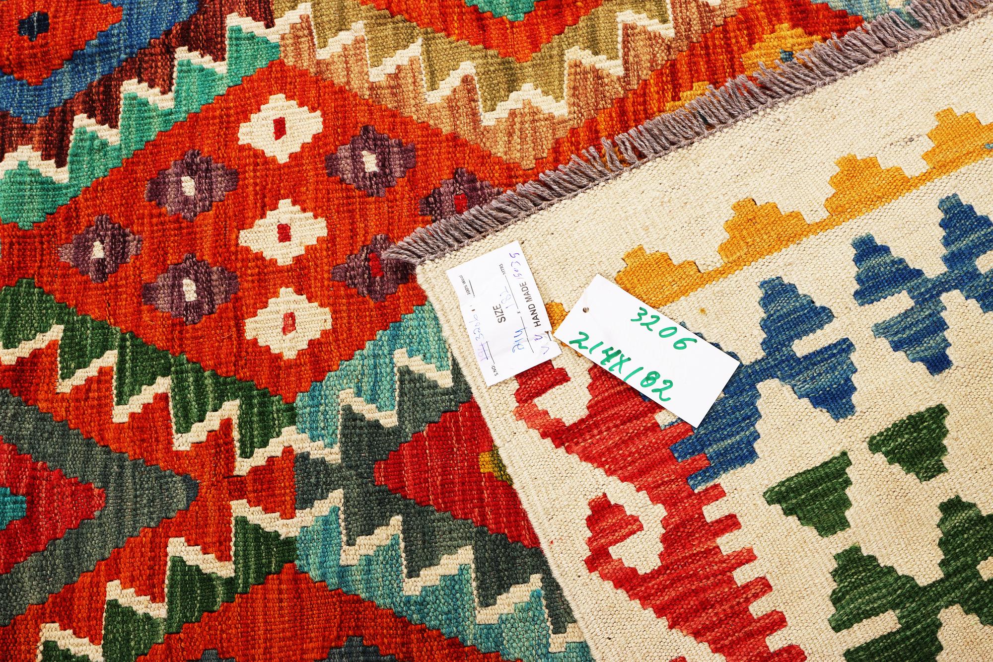 An Afghan Kilim rug, c. 214 x 182 cm.