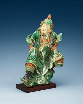 1235. A gren and yellow glazed roof tile figure, Ming dynasty.