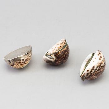 THREE COWRIE SHELL SNUFF BOXES, 19th century.