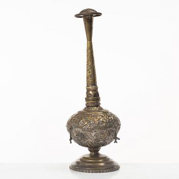 An 20th century british Raj repoussé metal rosewater sprinkler.