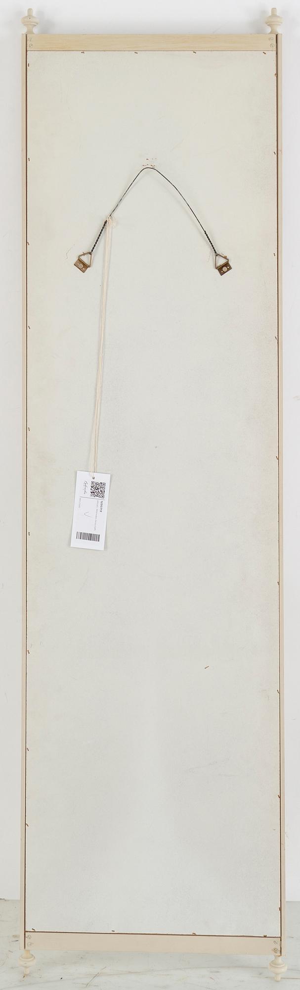 A painted mirror, first half of the 20th Century.