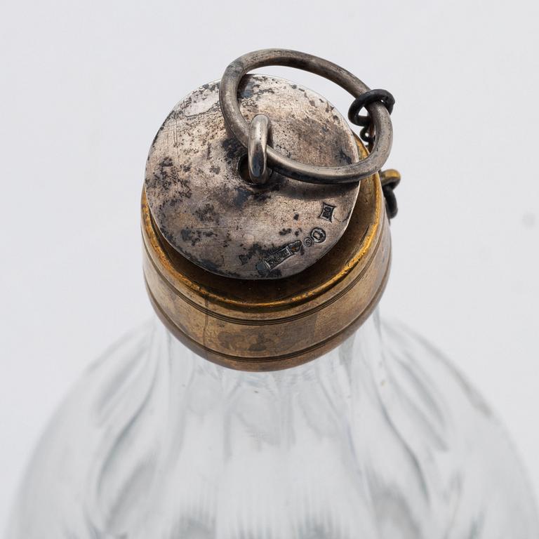 A pair of late gustavian glass and silver vinegar bottles, circa 1800.