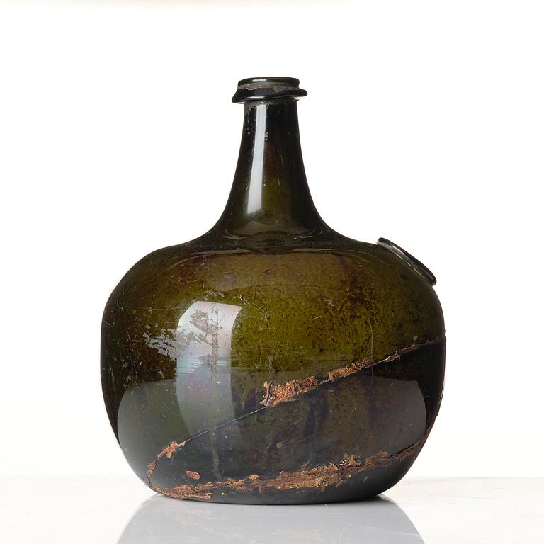 A large armorial wine bottle, Skånska glass manufactory, Henrikstorp, 18th century.