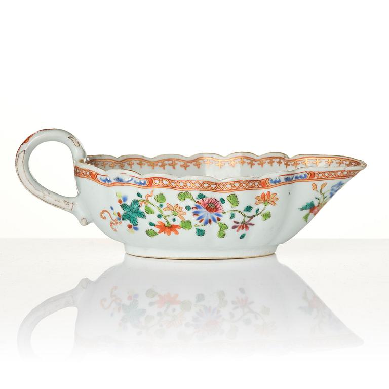 A group of famille rose 'double peacock' serving dishes, Qing dynasty, Qianlong (1736-95). (8 pieces).