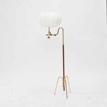 A brass floor lamp.21st Century.