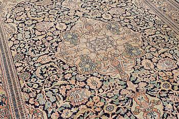 A Kashmir carpet, silk, c. 333 x 234 cm.