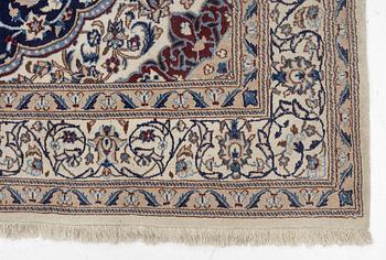 A Nain carpet, c. 295 x 190 cm.