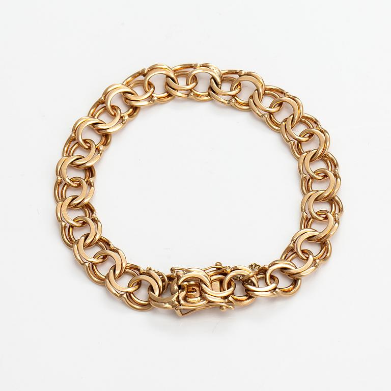 A 14K gold bracelet. Bismarck-koru, Helsinki 1975.