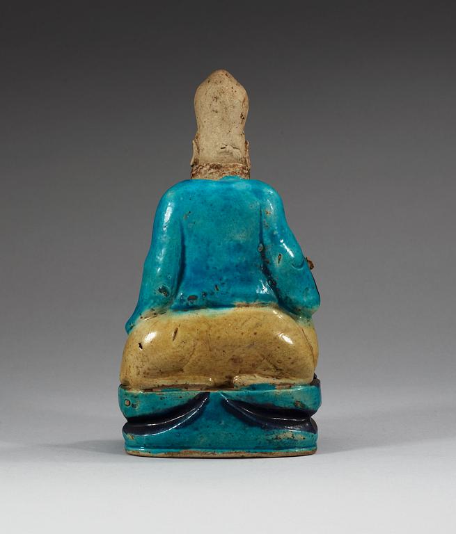 A turquoise-glazed porcelain figure of Shoulao, 17th Century.