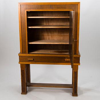 A 1920's oak cabinet.