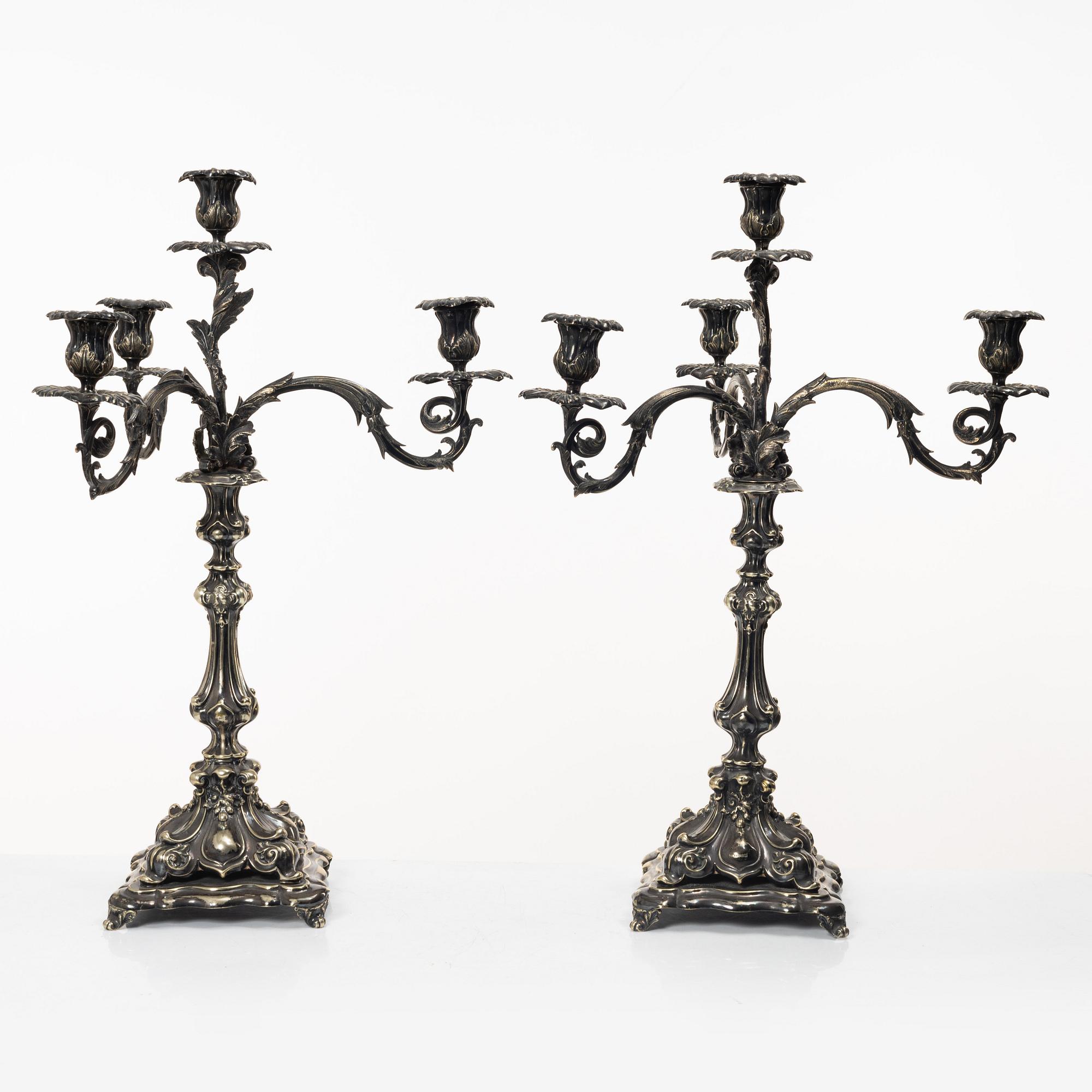 A pair of silver plated Rococo style candelabra, 20th century.