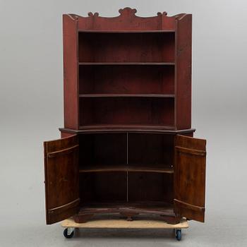 A 19th century corner cupboard.