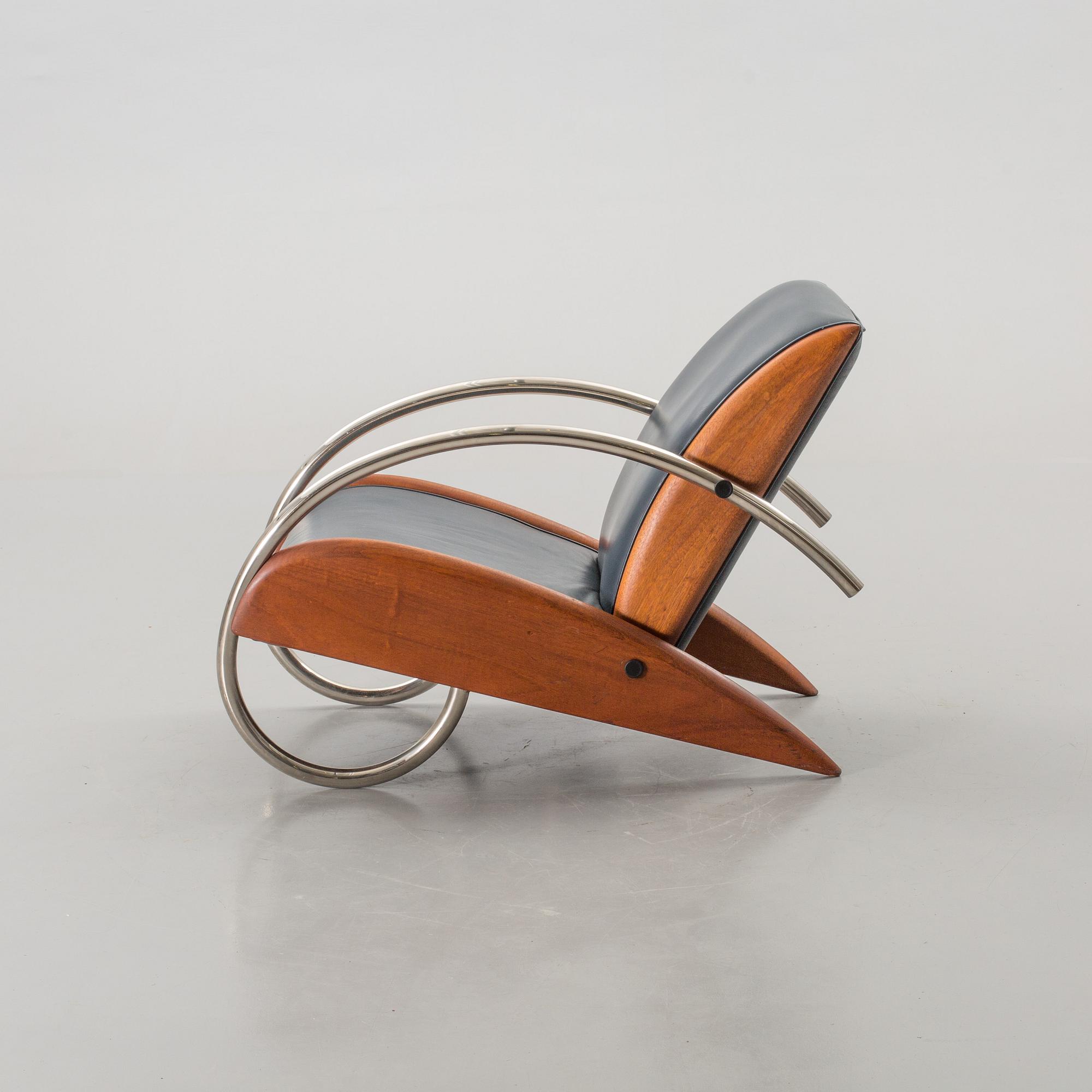 AN "STEAMLINE" ARMCHAIR BY KLAUS WETTERGREN, DENMARK, 1980'S.