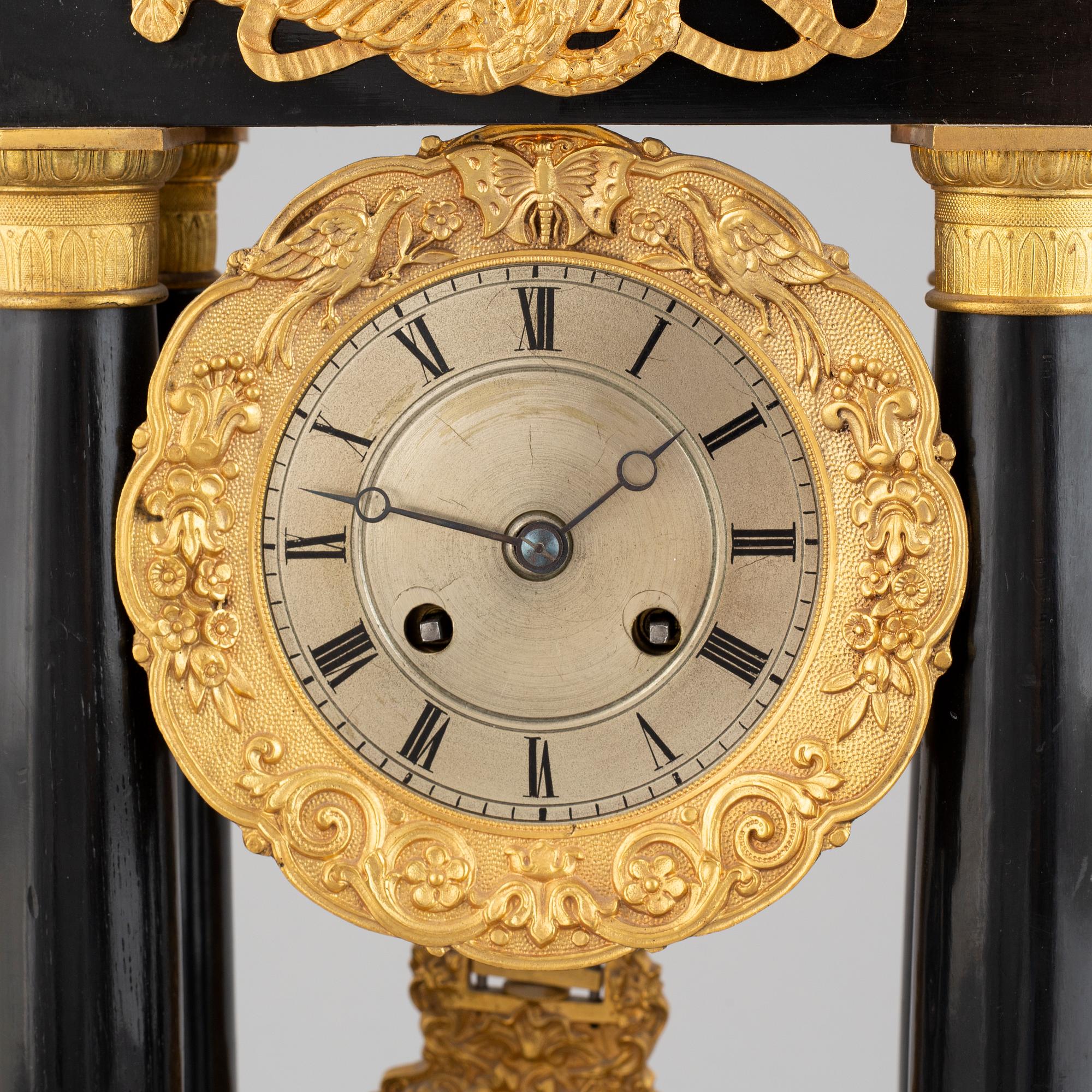 A mid 19th Century mantel clock.
