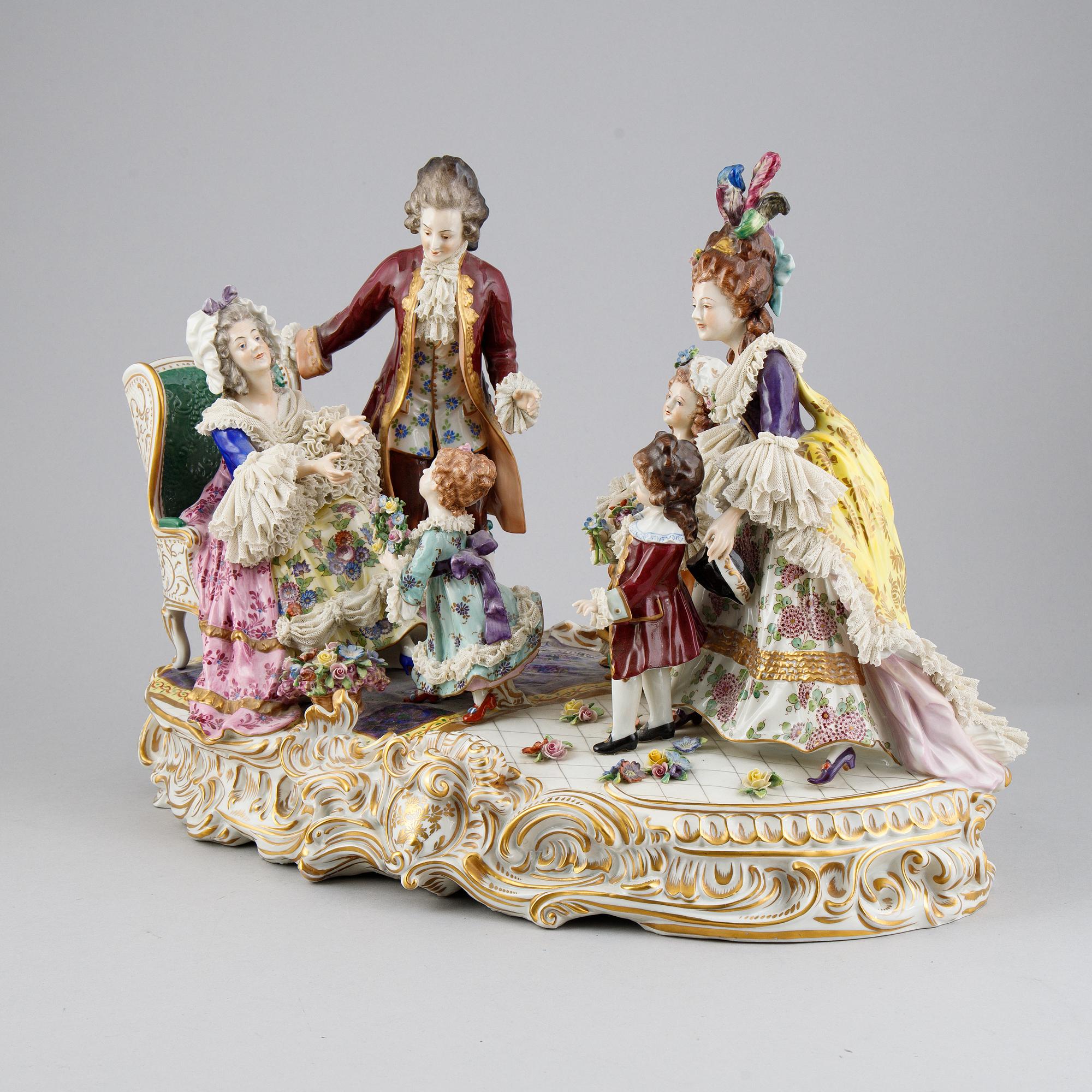 A Rococo style porcelain figurine group, Rudolstadt Volkstedt, Germany, early 20th Century.