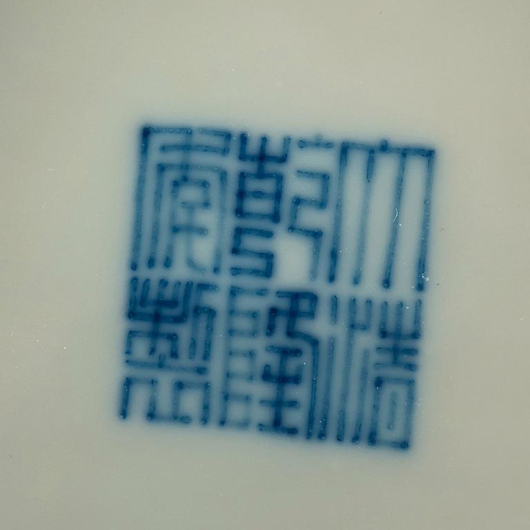 A pair of blue and white dishes, Qing dynasty (1644-1912), with Qianlong seal mark.