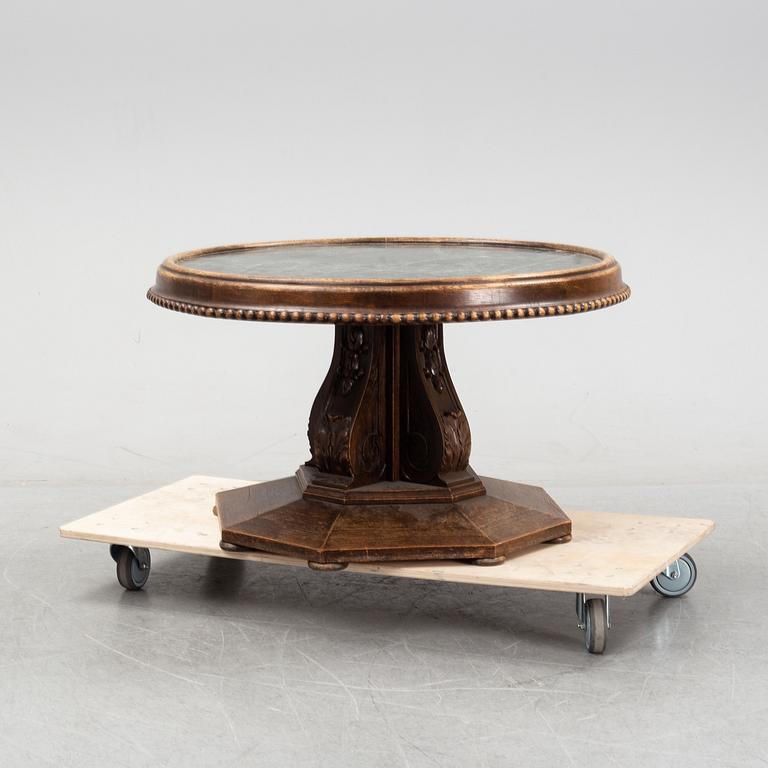 A oak and stone coffee table, first half of the 20th century.